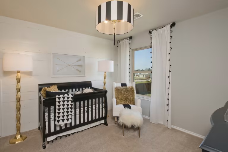 1804 Spg Mountain Cove Georgetown, TX 78628 - Photo 25 of 32 a bedroom with furniture and a window