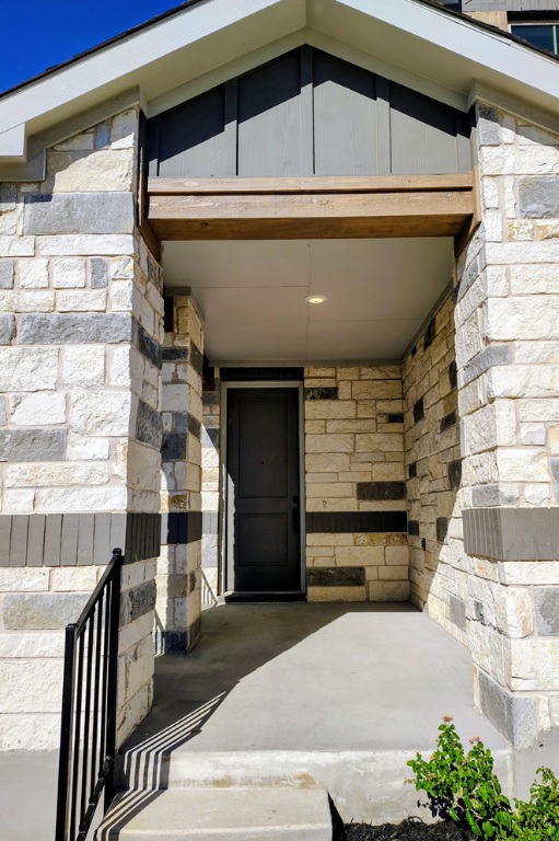 1804 Spg Mountain Cove Georgetown, TX 78628 - Photo 5 of 32 a view of entryway with a front door