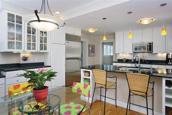 91 Nehoiden Road Newton, MA 02468 - Photo 4 of 12 a kitchen with a table and chairs in it