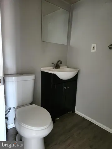 a kitchen with stainless steel appliances granite countertop a sink and a refrigerator