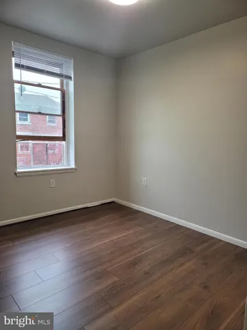 a living room with rug