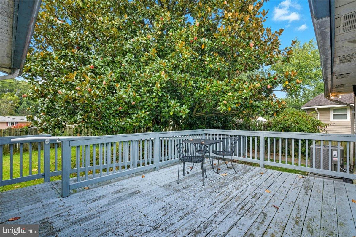 619 Aspen Lane Edgewood, MD 21040 - Photo 30 of 35 a view of deck with two chairs and wooden floor