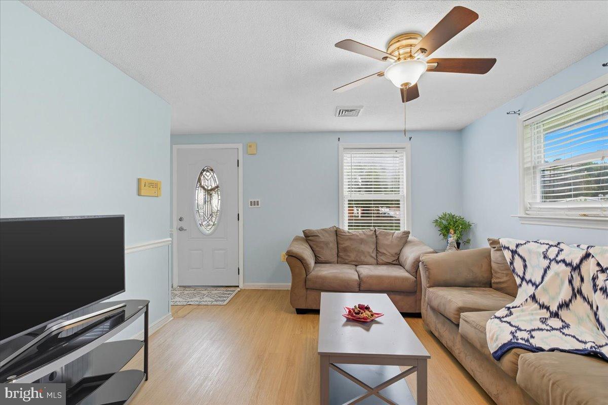 619 Aspen Lane Edgewood, MD 21040 - Photo 8 of 35 a living room with furniture and wooden floor