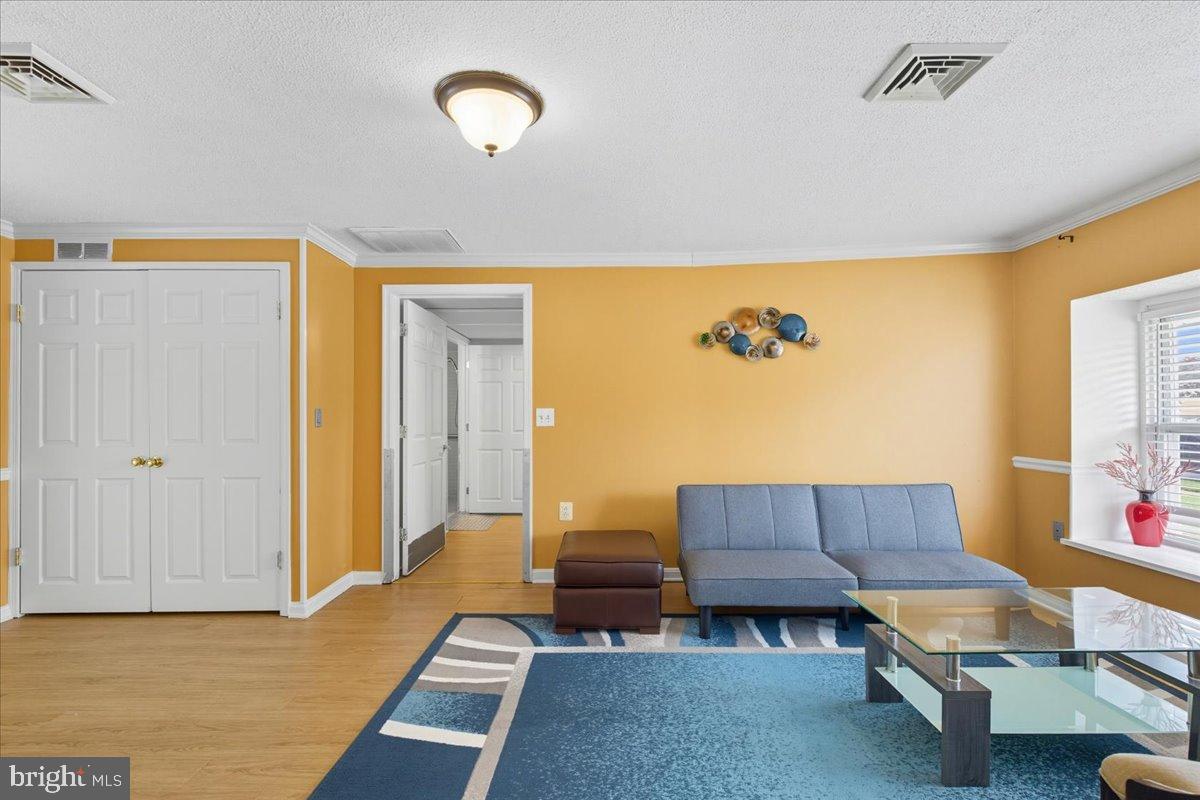 619 Aspen Lane Edgewood, MD 21040 - Photo 10 of 35 a living room with furniture and wooden floor