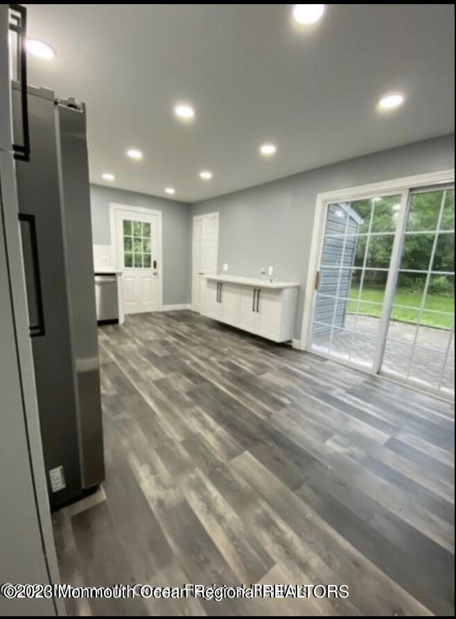 437 Redmond Avenue Oakhurst, NJ 07755 - Photo 7 of 26 a view of a kitchen with a sink and a window