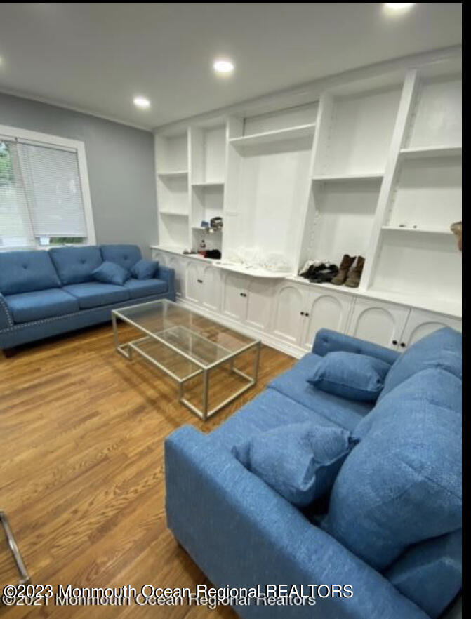 437 Redmond Avenue Oakhurst, NJ 07755 - Photo 8 of 26 a living room with furniture and a table