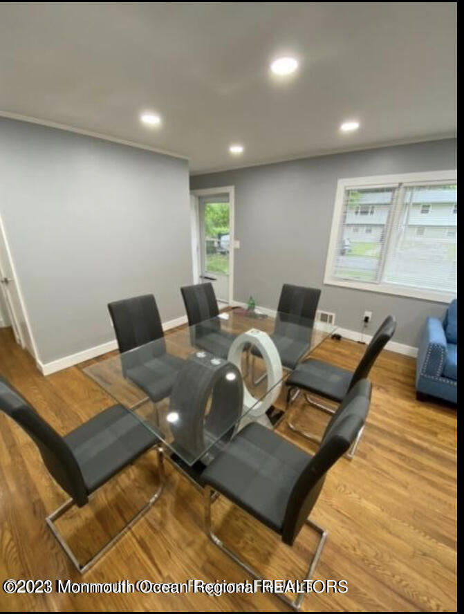 437 Redmond Avenue Oakhurst, NJ 07755 - Photo 9 of 26 a living room with a rug