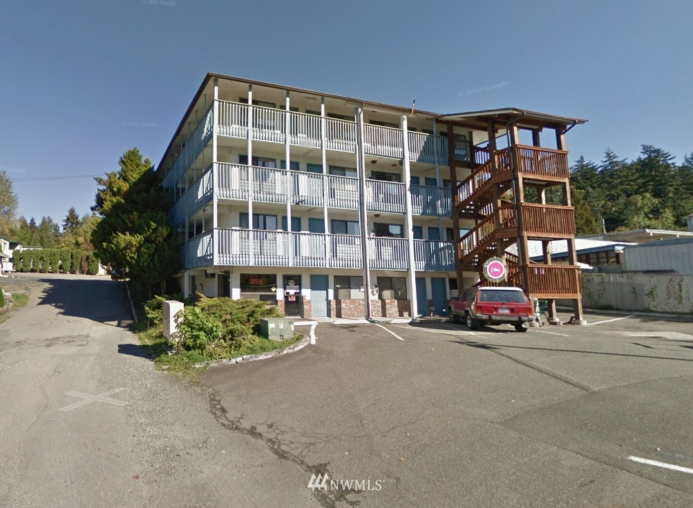 8202 Northeast Bothell Way Kenmore, WA 98028 - Photo 1 of 5 a front view of a building with street view