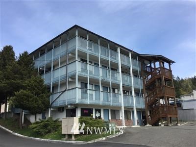 8202 Northeast Bothell Way Kenmore, WA 98028 - Photo 3 of 5 a front view of a building with street view