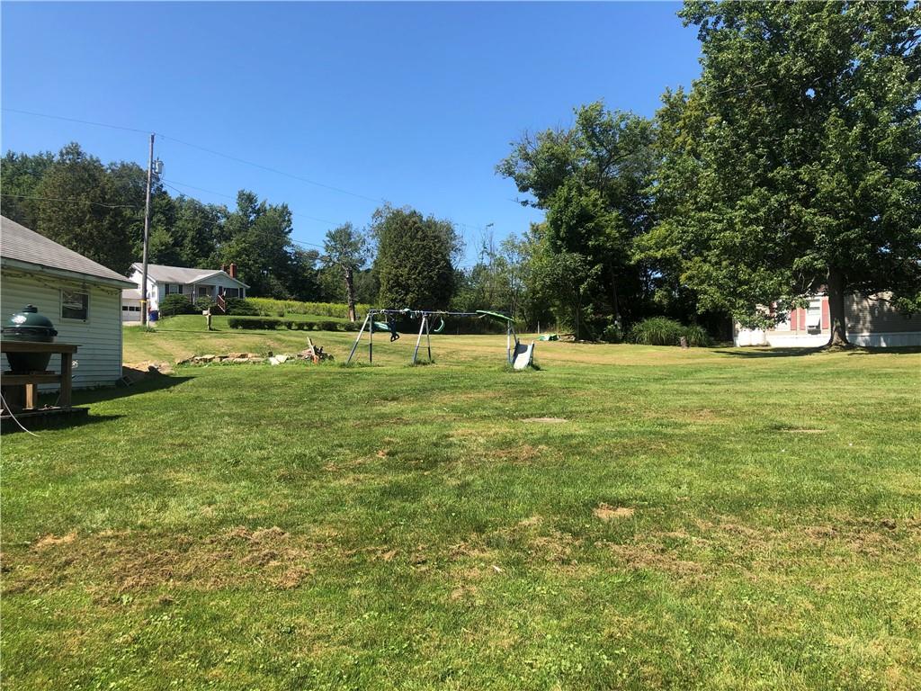 106 Boozel Road Slippery Rock, PA 16057 - Photo 3 of 19 A beautiful green yard!