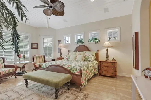 a bedroom with a bed and furniture
