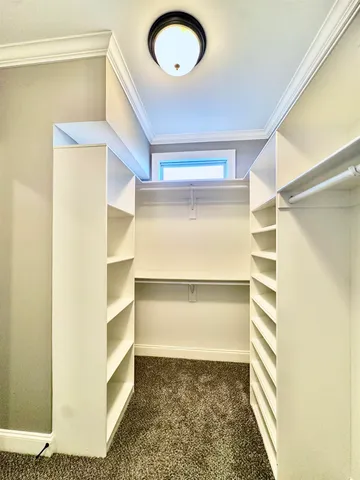 a bathroom with a tub and a shower