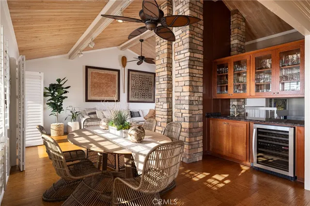 a view of an outside dining space with furniture