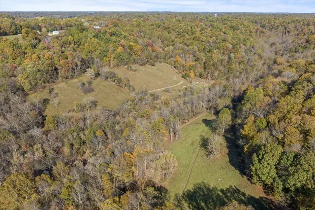 a view of a field with an outdoor space