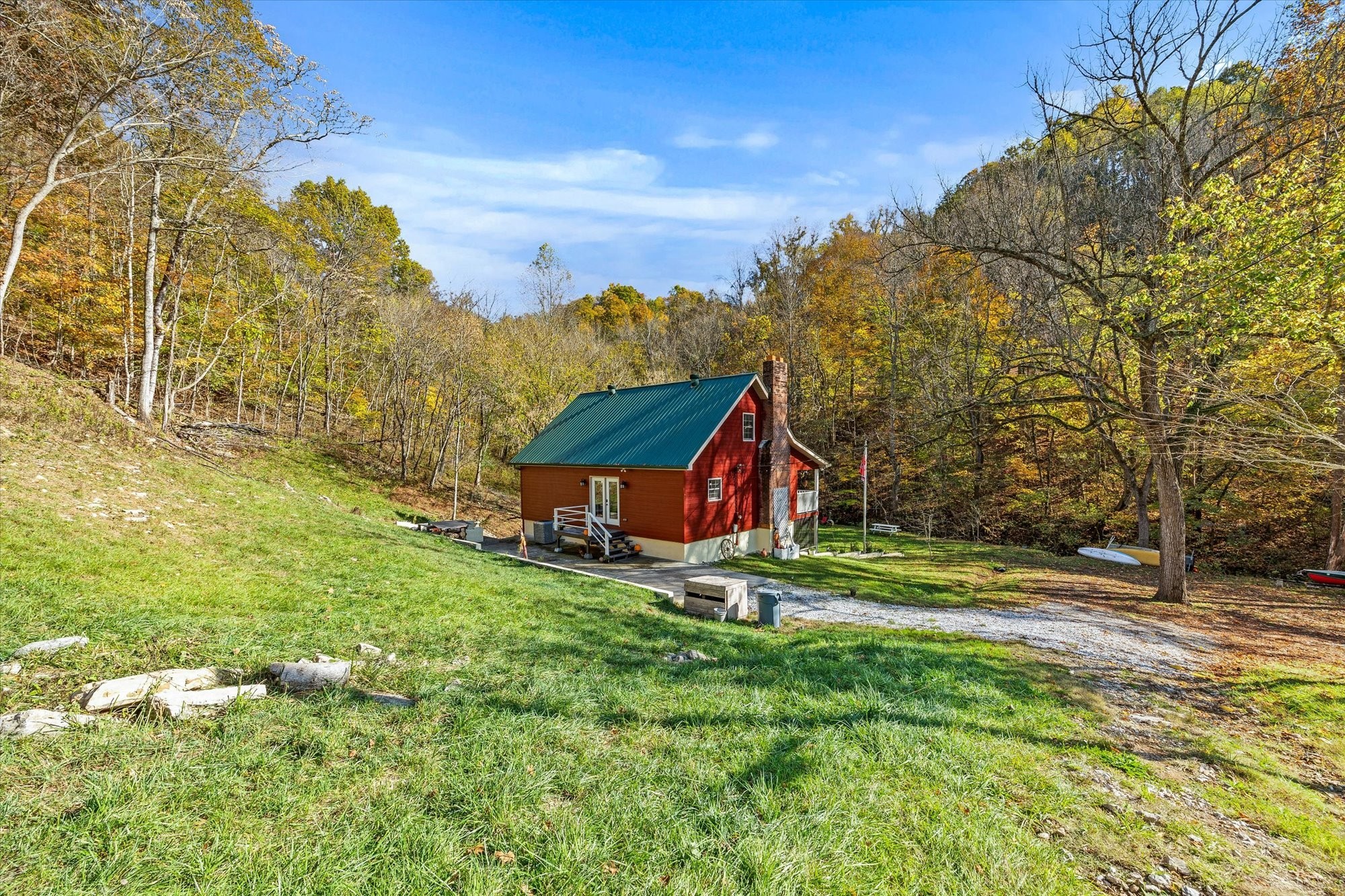 89 Ouchonder Road Elmwood, TN 38560 - Photo 42 of 50 a view of a wooden house with a yard