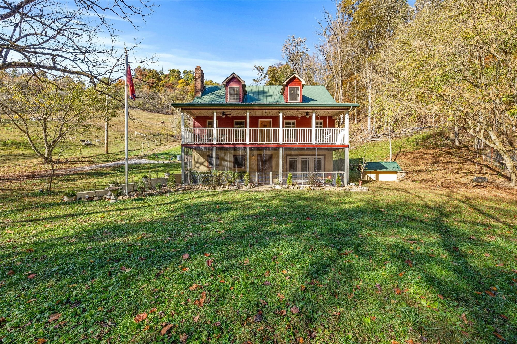 89 Ouchonder Road Elmwood, TN 38560 - Photo 5 of 50 a view of a house with a backyard