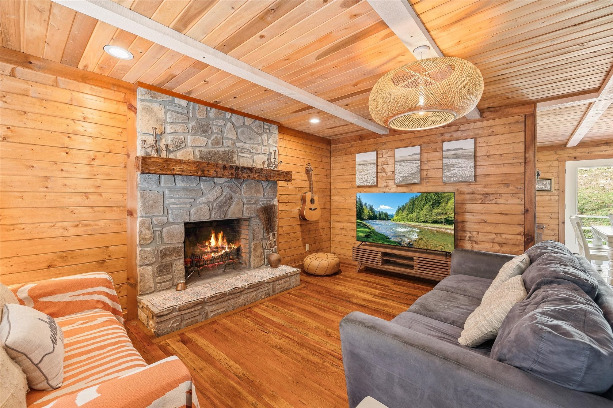 89 Ouchonder Road Elmwood, TN 38560 - Photo 9 of 50 a living room with furniture a flat screen tv and a fireplace