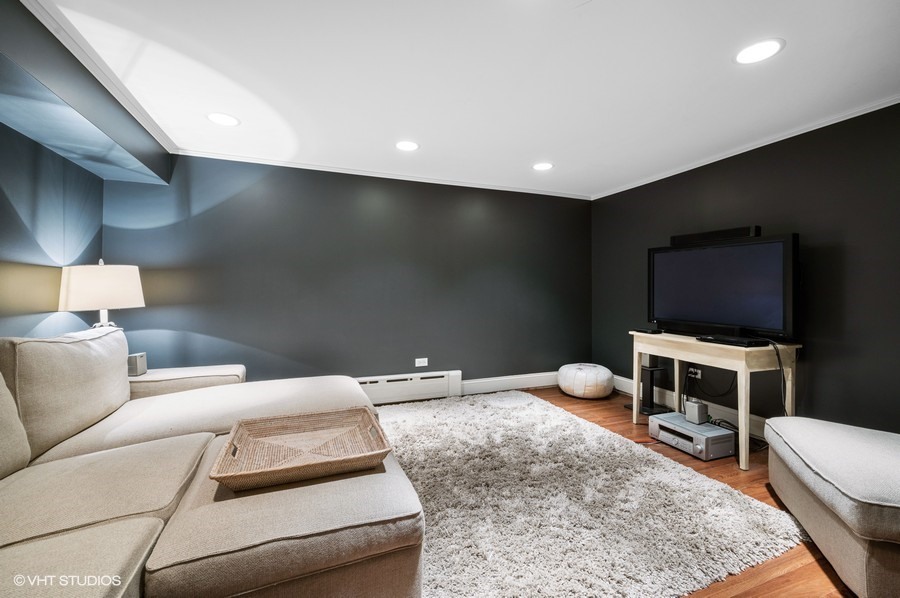 111 Robsart Road Kenilworth, IL 60043 - Photo 40 of 49 a living room with furniture and a flat screen tv
