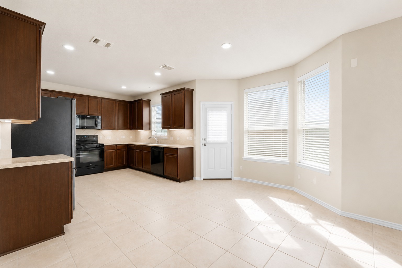 1443 Green Highland Dr Spring Spring, TX 77373 - Photo 9 of 26 Breakfast Room into Kitchen
virtual