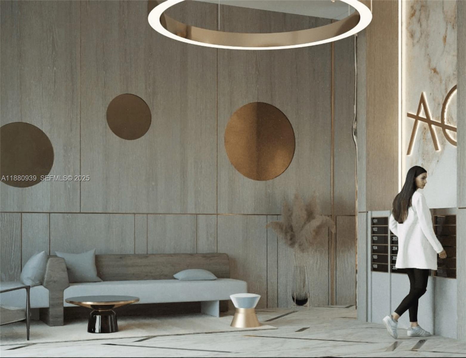 2479 Northeast 192 Street, Unit 201 Miami, FL 33180 - Photo 22 of 25 a bathroom with a sink and a mirror