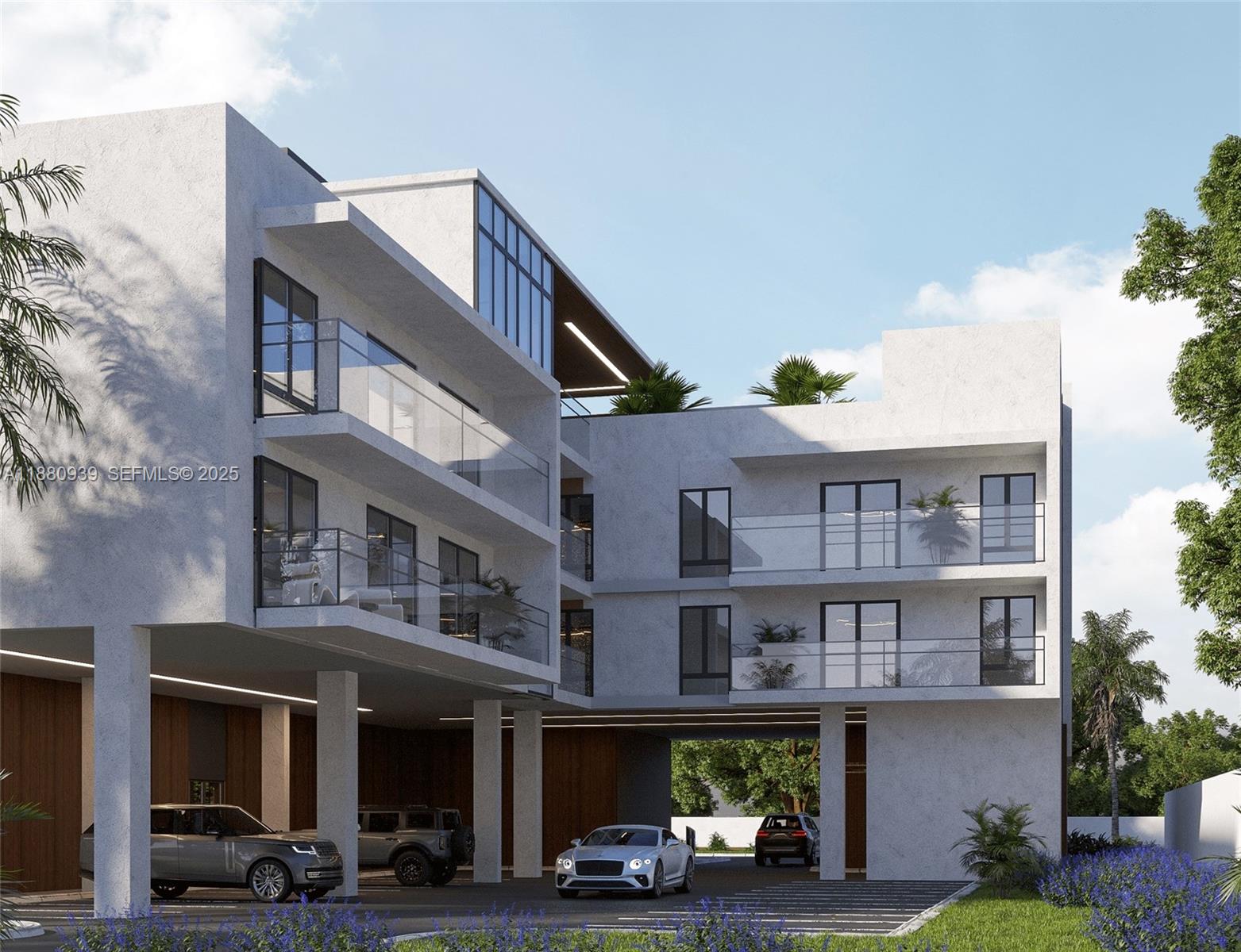 2479 Northeast 192 Street, Unit 201 Miami, FL 33180 - Photo 8 of 25 a front view of building with cars parked