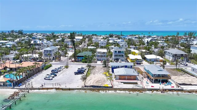 a street sign on a wall next to a wall