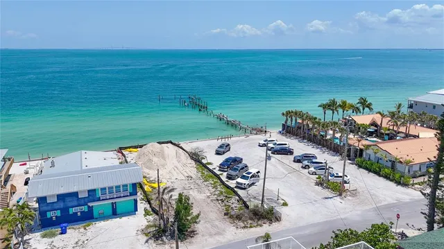 an aerial view of a house with a garden