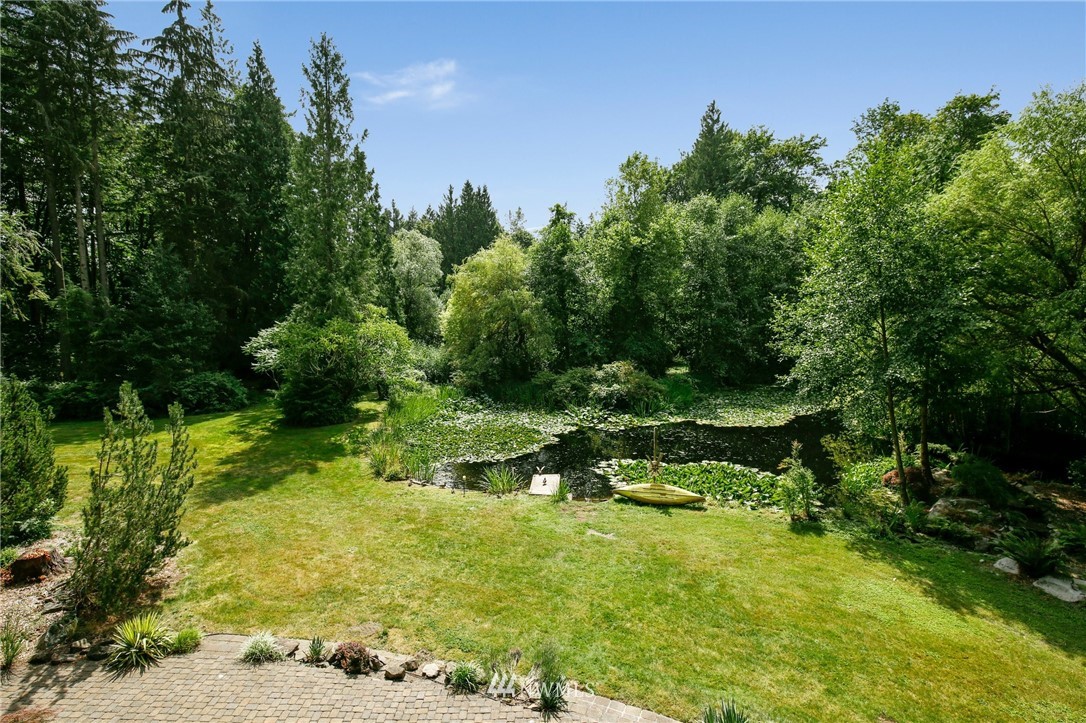 20830 Southeast 145th Street Renton, WA 98059 - Photo 14 of 39 a backyard of a house with a yard and outdoor seating