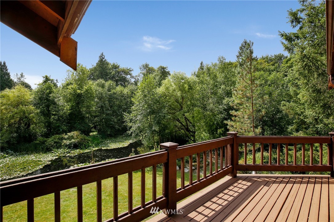 20830 Southeast 145th Street Renton, WA 98059 - Photo 15 of 39 a view of balcony with wooden floor and fence
