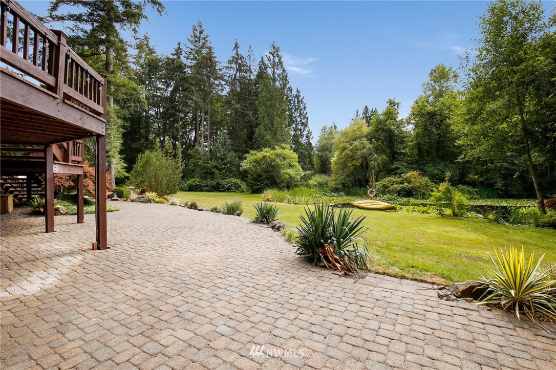 20830 Southeast 145th Street Renton, WA 98059 - Photo 27 of 39 a view of a swimming pool with a patio