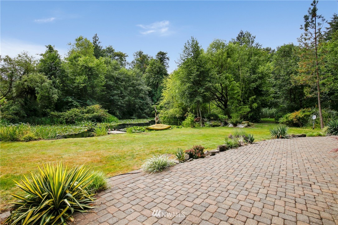 20830 Southeast 145th Street Renton, WA 98059 - Photo 29 of 39 a view of a swimming pool with a yard