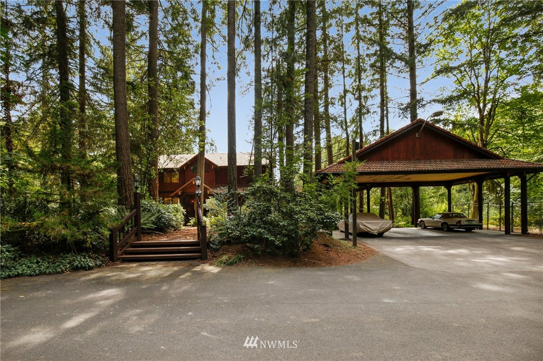 20830 Southeast 145th Street Renton, WA 98059 - Photo 32 of 39 a front view of a house with a garden