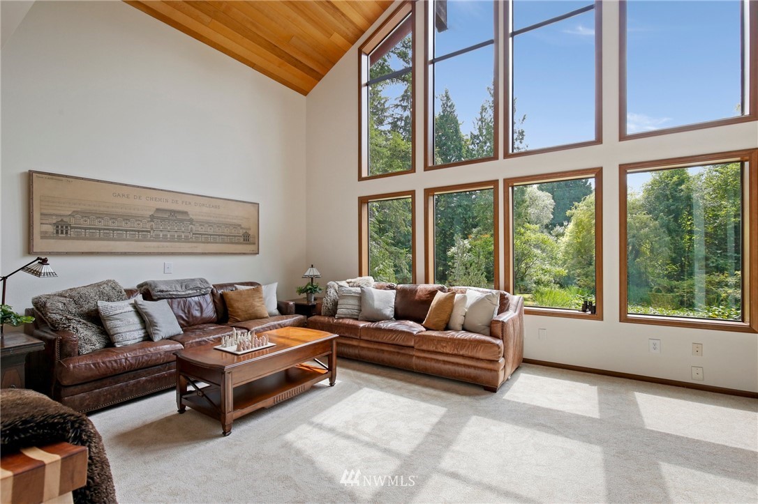 20830 Southeast 145th Street Renton, WA 98059 - Photo 5 of 39 a living room with furniture and a large window