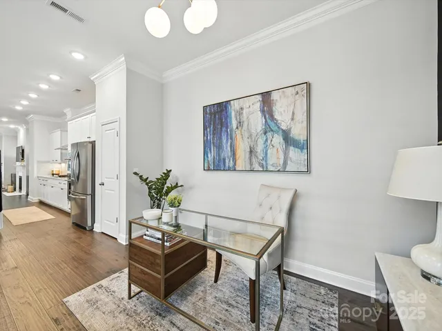 a spacious bathroom with a double vanity sink and a mirror
