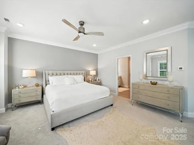 a front view of a house with a large window