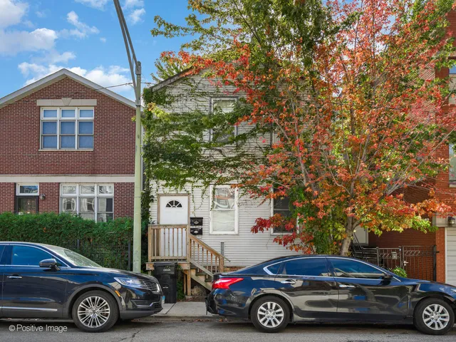 a car parked in front of a house