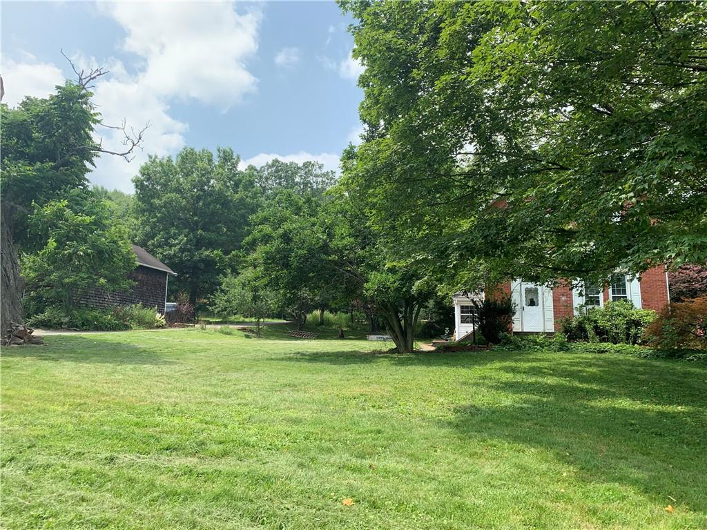 168 Boozel Road Slippery Rock, PA 16057 - Photo 21 of 24 a view of a tree in front of a house