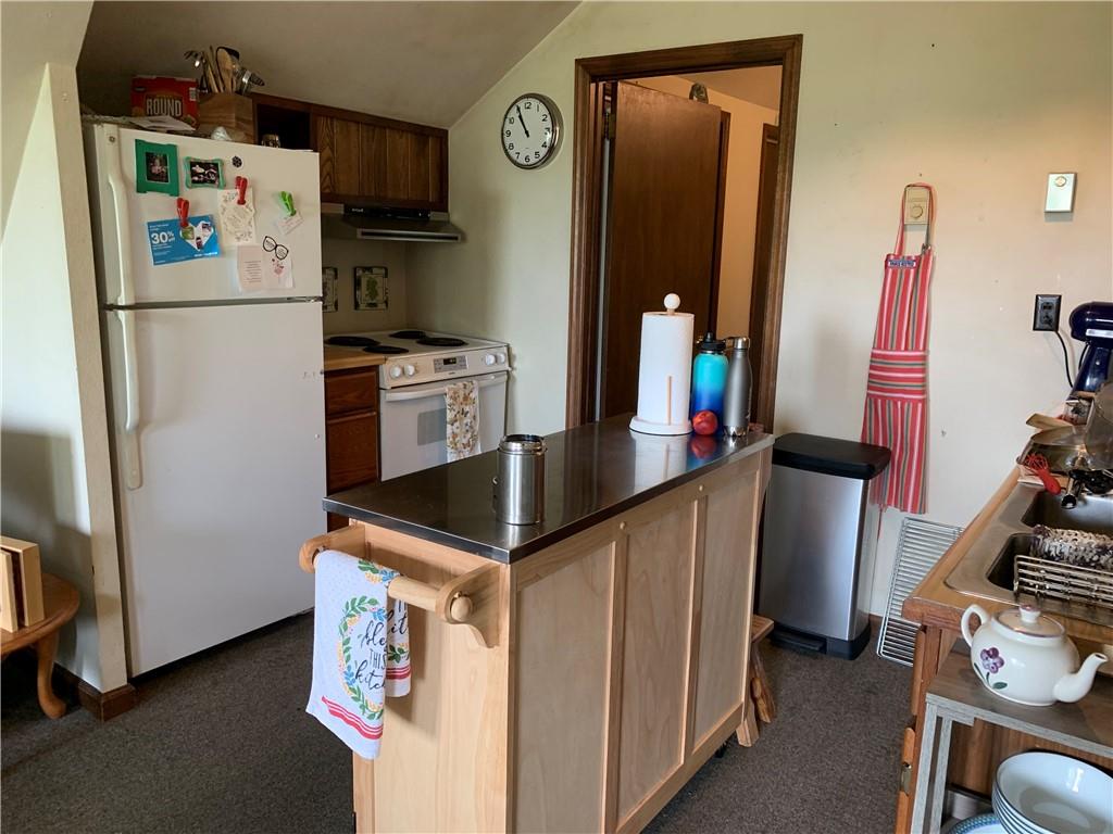 168 Boozel Road Slippery Rock, PA 16057 - Photo 24 of 24 a kitchen with stainless steel appliances a refrigerator and a stove top oven