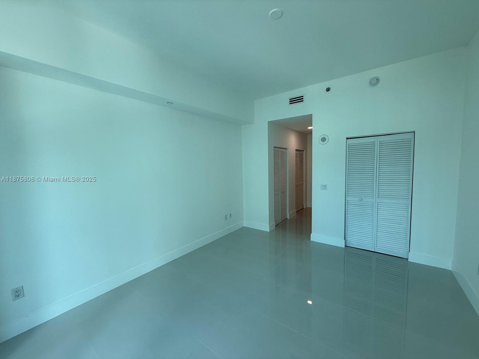 951 Brickell Avenue, Unit 1010 Miami, FL 33131 - Photo 13 of 23 a view of an empty room