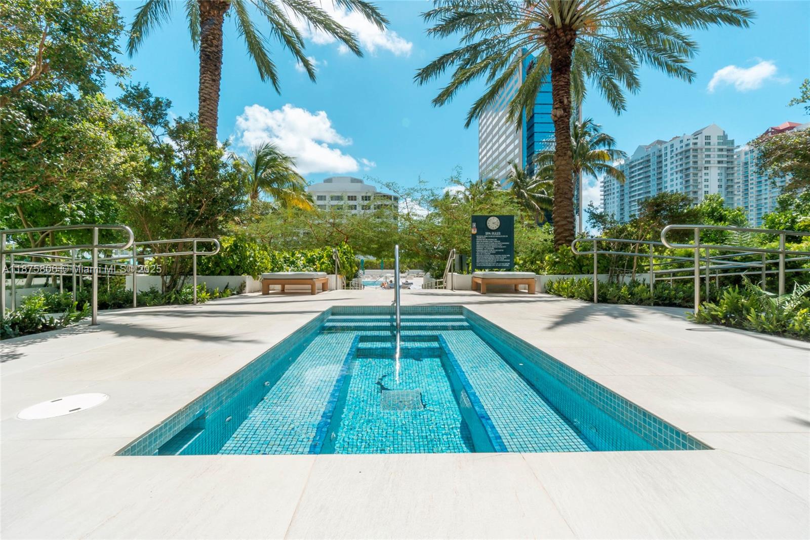 951 Brickell Avenue, Unit 1010 Miami, FL 33131 - Photo 18 of 23 a view of swimming pool with a garden