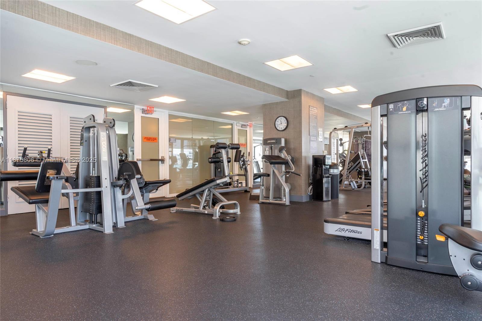 951 Brickell Avenue, Unit 1010 Miami, FL 33131 - Photo 19 of 23 a view of a room with gym equipment