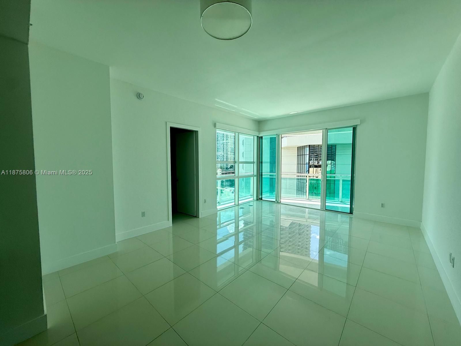 951 Brickell Avenue, Unit 1010 Miami, FL 33131 - Photo 4 of 23 a view of entryway with kitchen