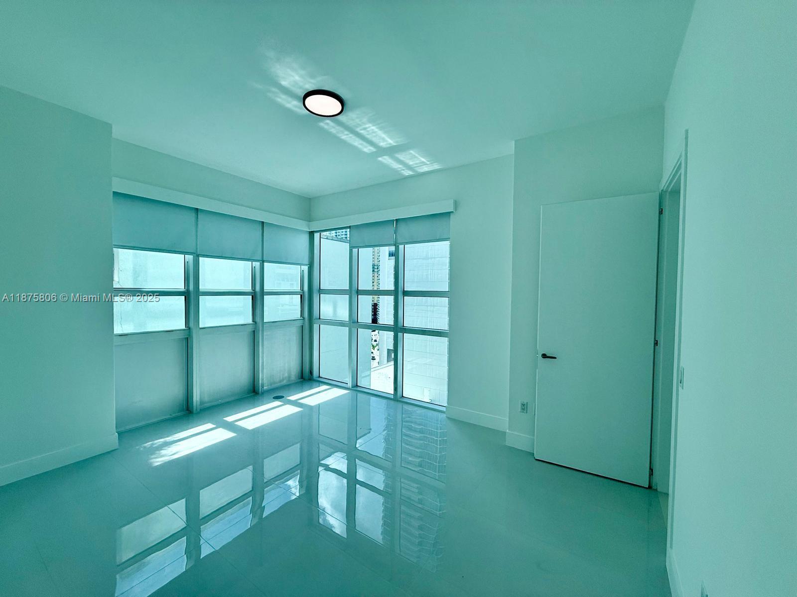 951 Brickell Avenue, Unit 1010 Miami, FL 33131 - Photo 9 of 23 a workspace and entryway