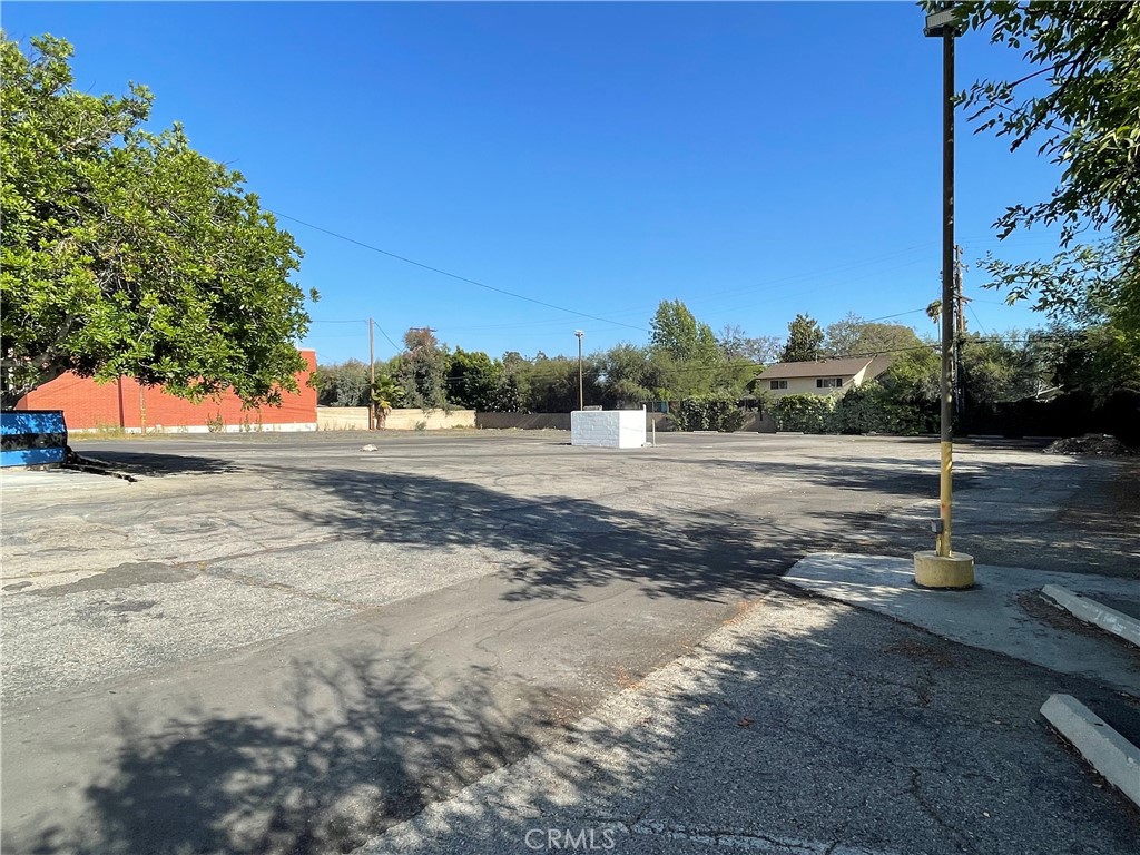 962 West Foothill Boulevard Claremont, CA 91711 - Photo 3 of 11 a view of a road with a yard