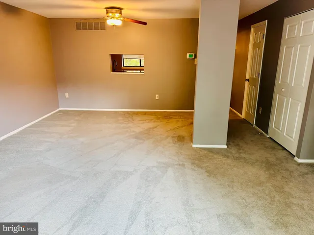 a view of a room with a door