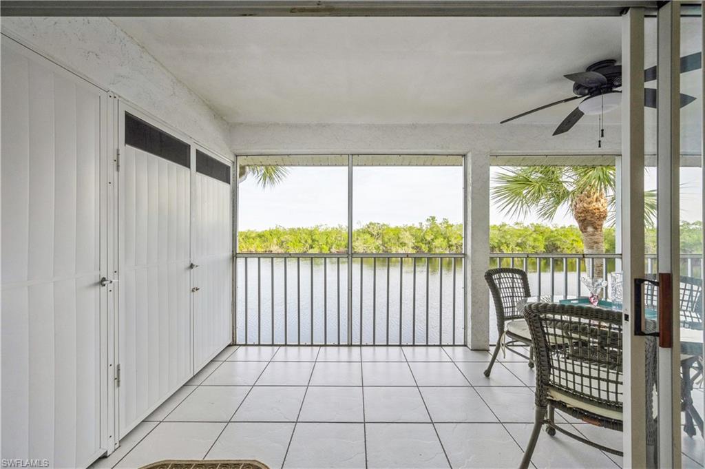 1325 Mainsail Drive, Unit 1213 Naples, FL 34114 - Photo 17 of 40 a view of a room with a large window
