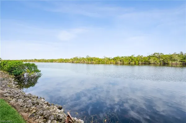 a view of a lake with outdoor space