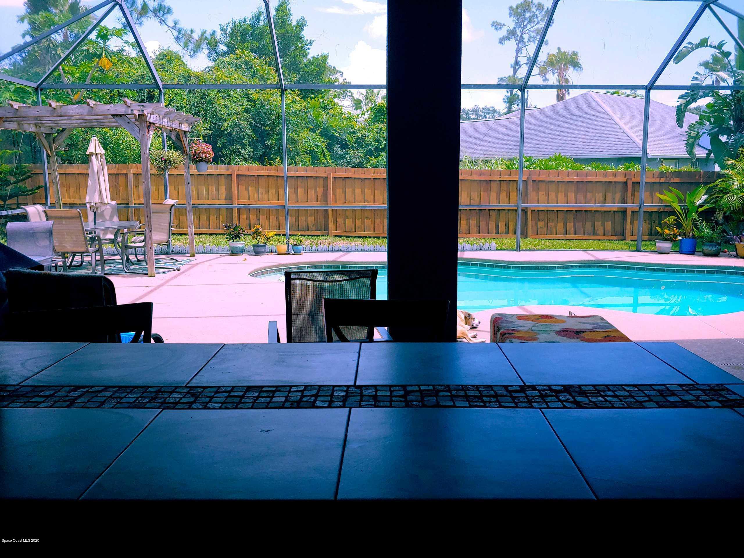 6791 Hartford Road Cocoa, FL 32927 - Photo 39 of 43 a view of an outdoor space and a yard