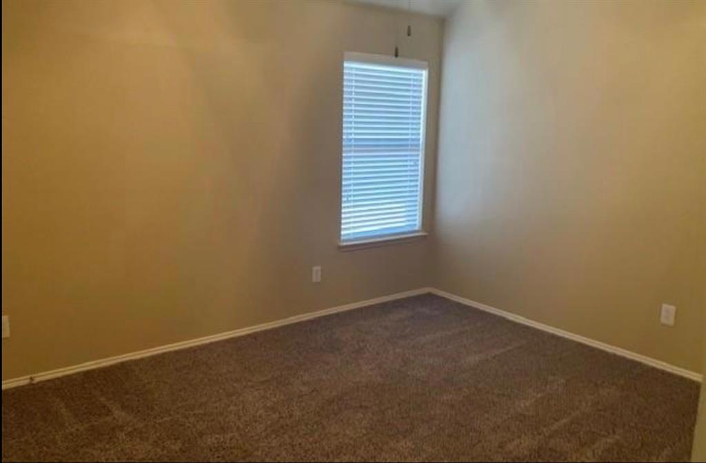 3321 Truman Street McKinney, TX 75071 - Photo 13 of 26 an empty room with a window