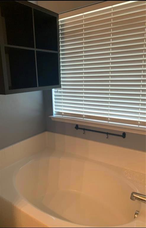3321 Truman Street McKinney, TX 75071 - Photo 17 of 26 a bathroom with a window